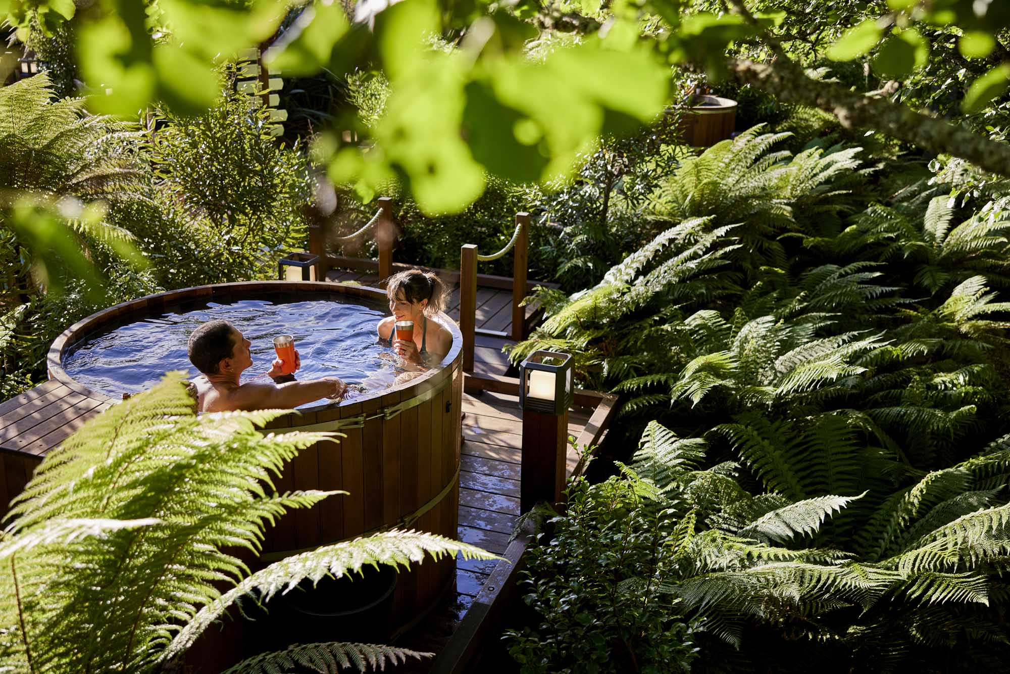 Soak in a private cedar hot tub overlooking the forest! - Image 3