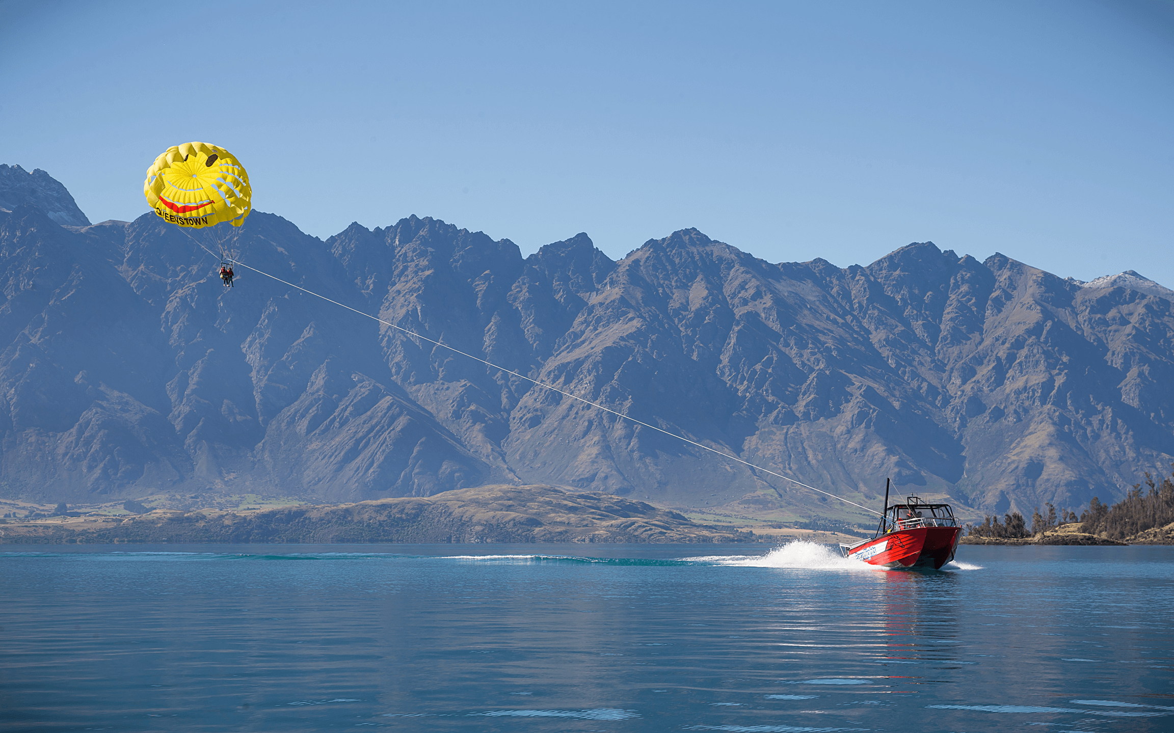 Take your seat in the sky with a Paraflight over Lake Wakatipu