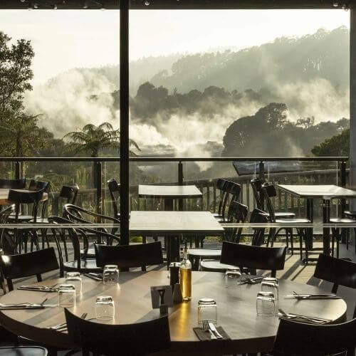 Enjoy a delicious hāngī buffet dinner overlooking Pohutu Geyser